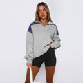 Damen lässiger Sweatshirt mit halbem Reißverschluss und kontrastierenden Ärmeln