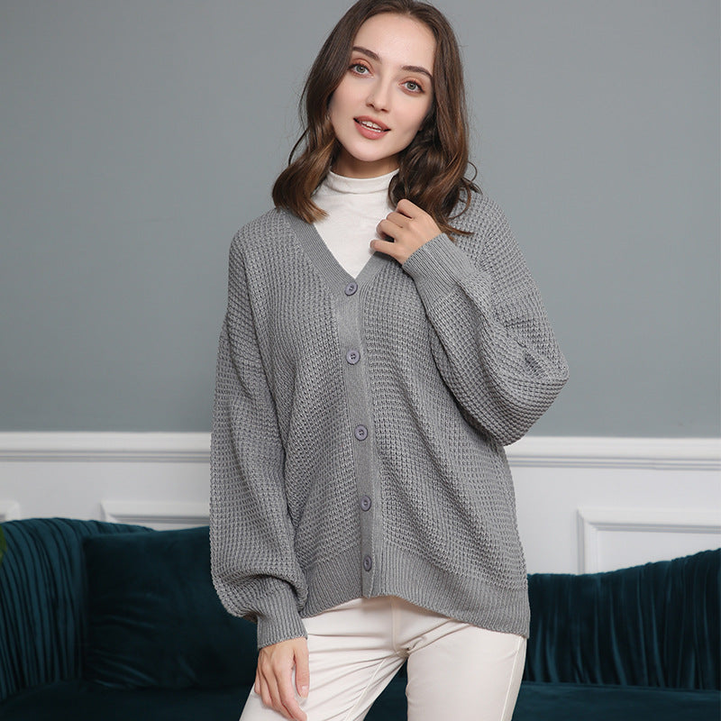 Damen Strickjacke mit strukturiertem Muster und praktischen Knopfdetails
