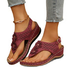 Damen Zehenstegsandalen mit floralen Lochdesign und komfortabler Fußbettgestaltung R&B