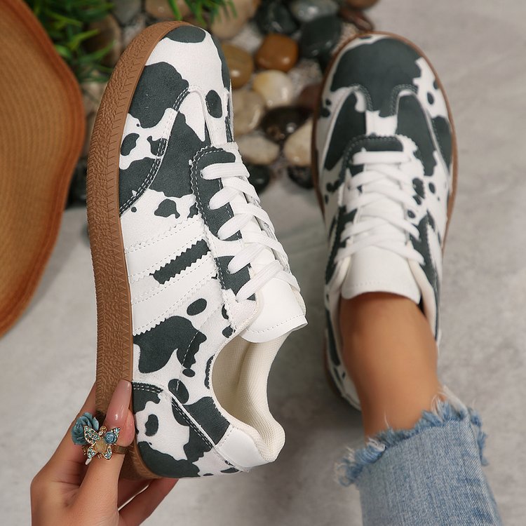 Damen Sportliche Sneakers mit trendigem Kuhdesign R&B