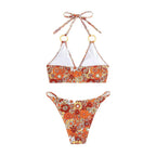Damen Triangel-Bikini mit modischem Blütenmuster und eleganten Ringdetails