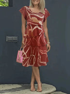 Damen fließendes Wickelkleid mit elegantem Layering und einzigartigem Muster R&B