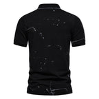 Herren Poloshirt mit kreativen Spritzdruck und hochwertiger Baumwolle