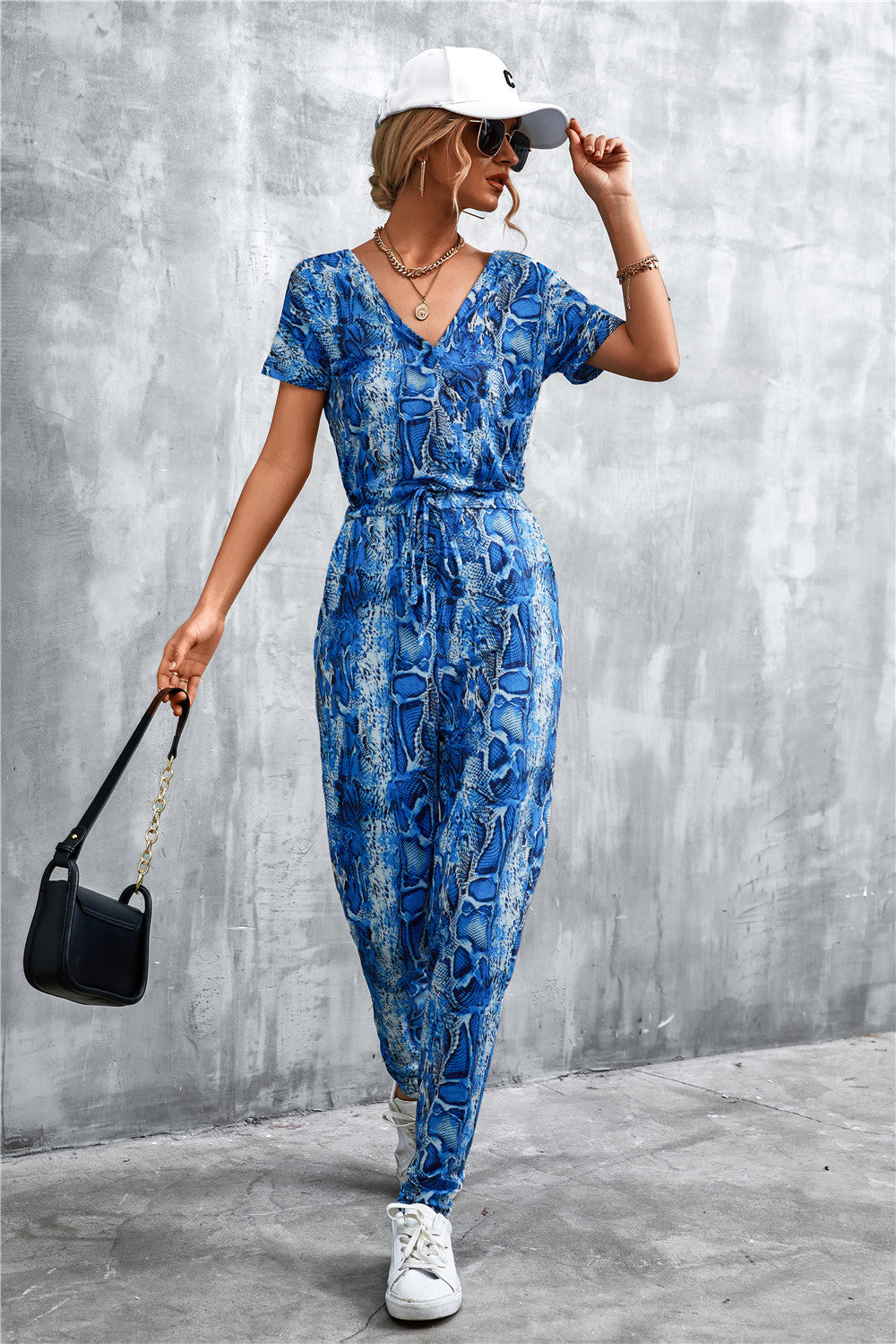 Damen elegante Jumpsuit im Snake-Print-Stil mit Taillengürtel und V-Ausschnitt R&B