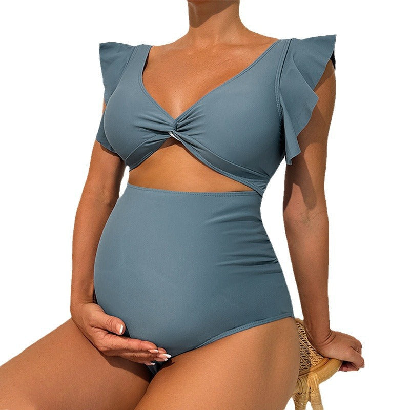 Damen Einteiler Badeanzug mit raffiniertem Wickeldetail und modischen Rüschenelementen R&B