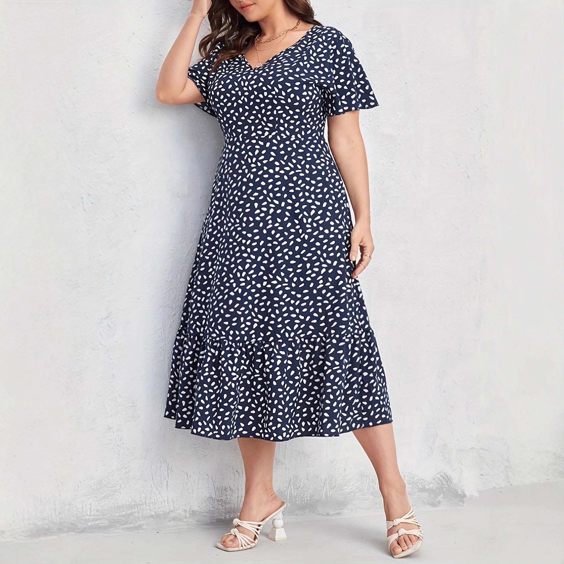 Damen Midi-Kleid mit fließendem Schnitt und verspieltem Muster R&B