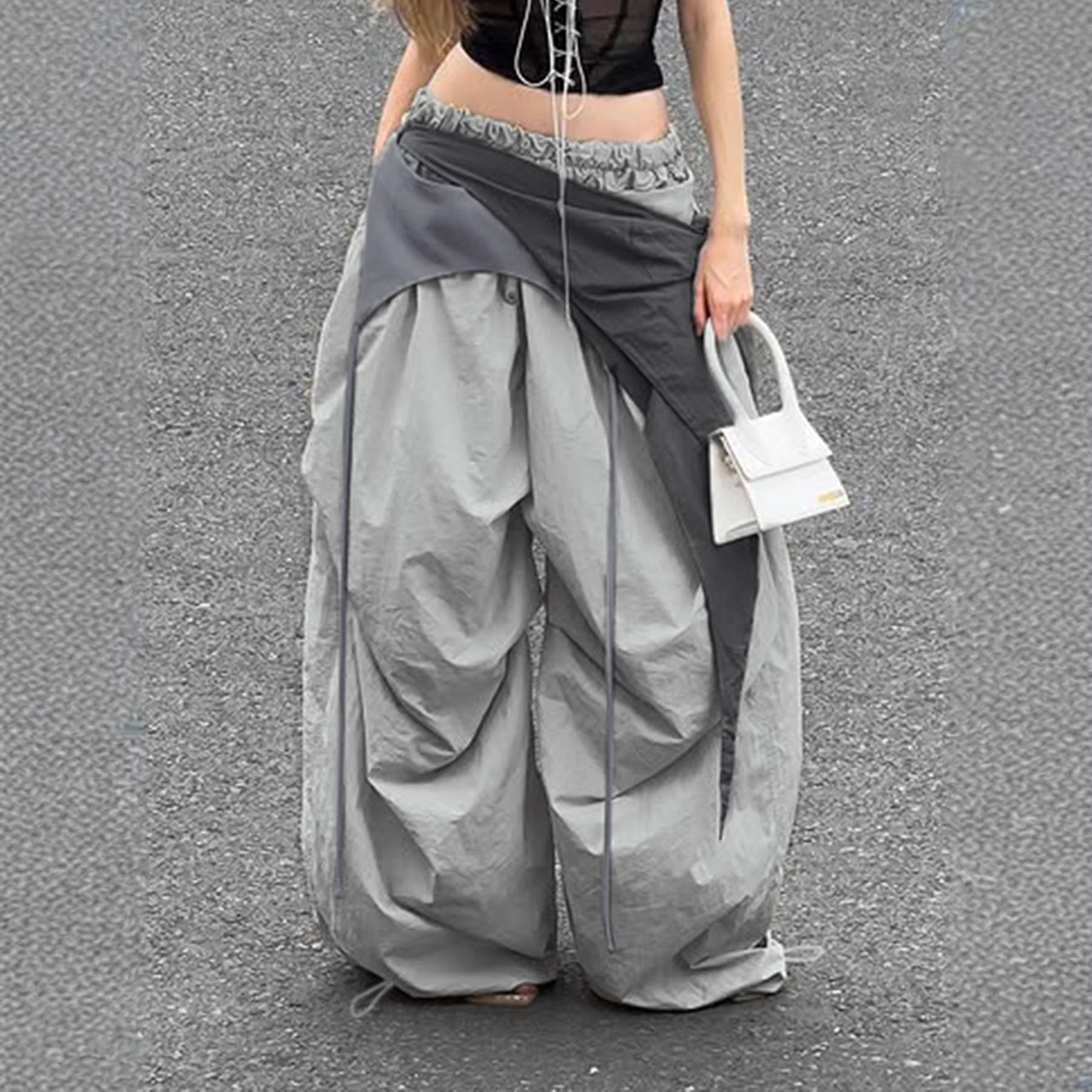 Damen modische High-Waist-Hose mit asymmetrischem Design und seitlichem Bindegurt R&B