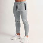 Herren nan schmal geschnittene Funktions-Jogginghose mit wasserdichter Reißverschlusstasche und elastischem Bund R&B