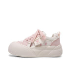 Damen Sneakers mit dekorativen Rüschen und verspielten Schleifen
