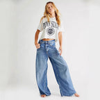 Damen Weite High-Waist Jeans mit fransigem Saum