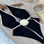 Damen Einteiler Badeanzug mit stilvollem Blütenakzent und raffinierten Trägerdetails R&B