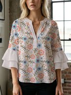 Damen Bluse mit voluminösen Flügelärmel und intensivem Blattmuster