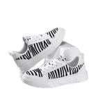 Damen Sportliche Sneakers mit elastischer Schnürsystem und modischem Streifenmuster