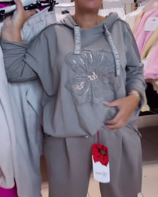 Damen nan entspanntes Lounge-Set mit Blüten-Pailletten-Hoodie, Kordelzug und weiter Bundfaltenhose R&B