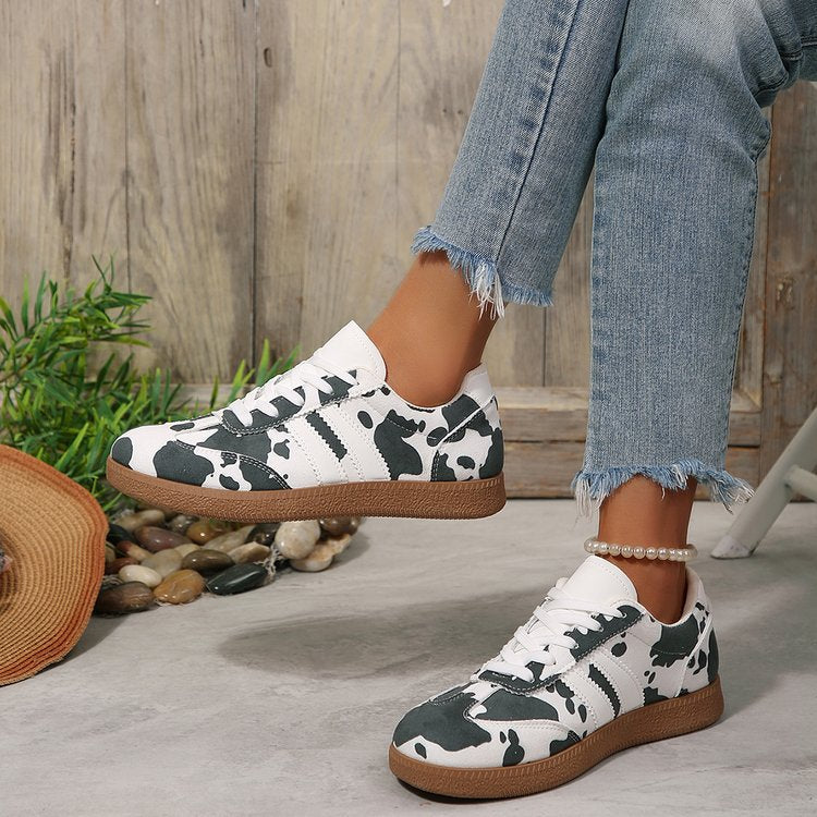 Damen Sportliche Sneakers mit trendigem Kuhdesign R&B