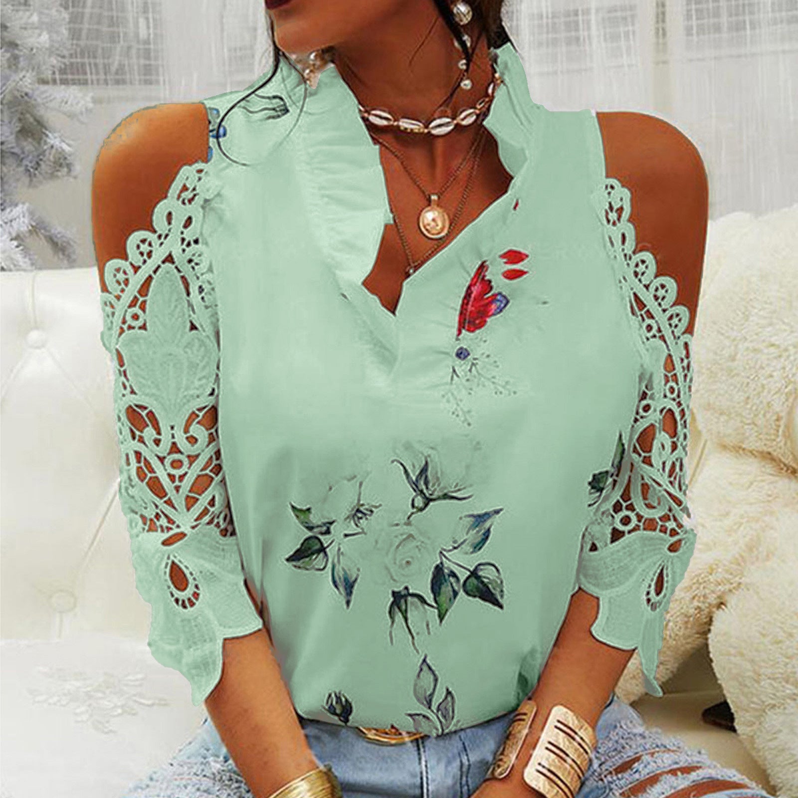 Damen Bluse mit Cut-Out-Ärmeln und floralem Design