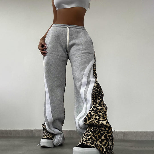 Damen Sportliche Sweatpants mit Leomuster und seitlichen Streifen R&B