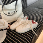 Damen Sportliche Sneaker mit minimalistischer Silhouette und atmungsaktiver Oberflächenstruktur