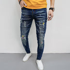 Herren Skinny Fit Jeans mit kreativen Farbklecksen und Rissdesign R&B