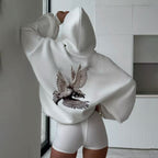 Damen Kapuzensweater mit kunstvollem Vogelmotiv und entspannter Passform