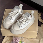 Damen Sneakers mit glitzernden Applikationen und hochgezogenem Plateau