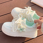 Damen Trendige Sneakers mit blumigen Akzenten und dämpfender Sohle
