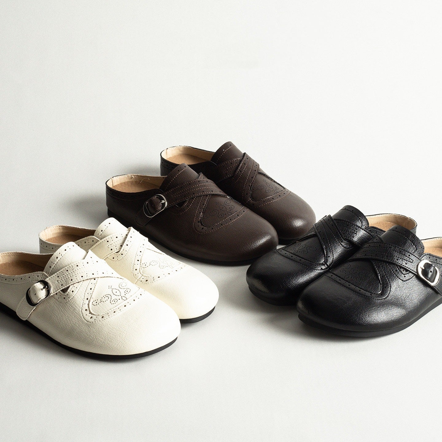 Damen modische Clogs mit geschmackvollem Schnallenakzent und hochwertiger Lederoberfläche R&B