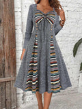 Damen Kleid mit einzigartigem Musterspiegel und knopfverzierter Taille