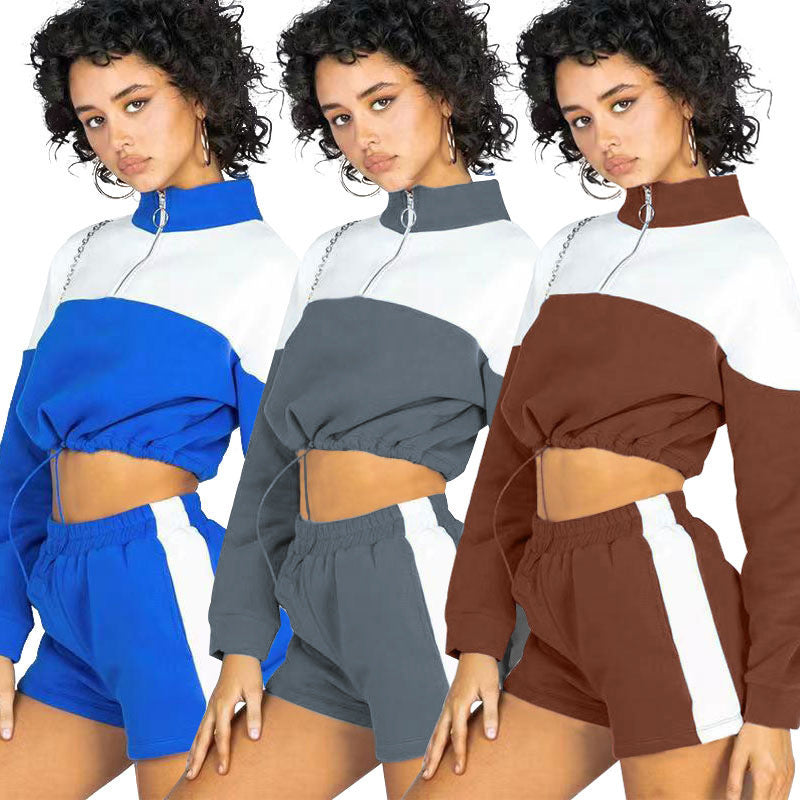 Damen modernes Sportoberteil mit kurzem Schnitt und dazu passender Shorts R&B