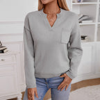 Damen lässiger Pullover mit Knopfdetails und Brusttasche