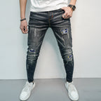 Herren Skinny Fit Jeans im kreativen Rissdesign und bunten Farbsklecks R&B