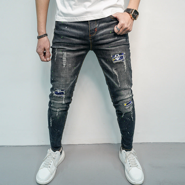 Herren Skinny Fit Jeans im kreativen Rissdesign und bunten Farbsklecks R&B