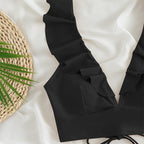 Damen Oberteil mit Rüschen und hohen Bikinihosen