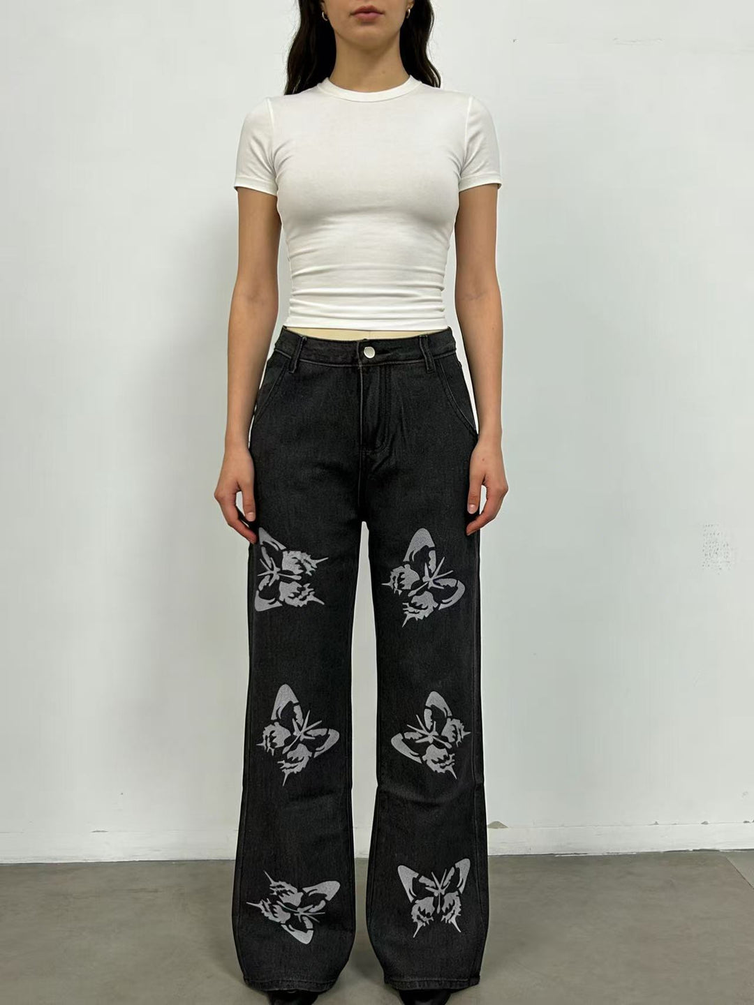 Damen Flared Jeans mit Blumendruck und hohem Bund