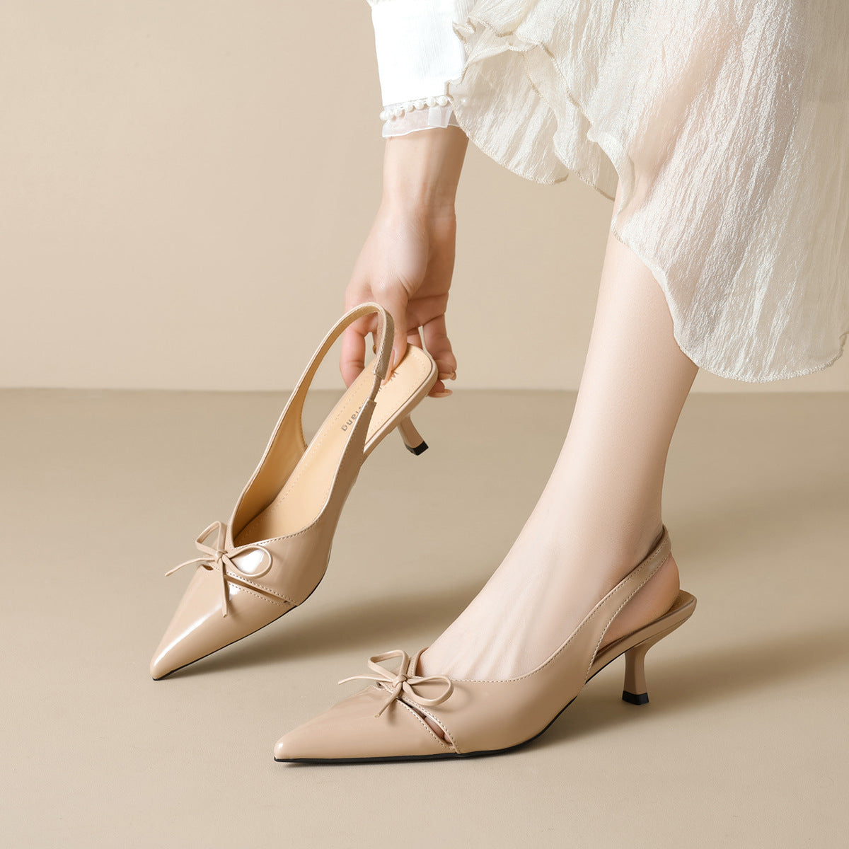 Damen Slingback-Pumps mit modischem Schleifendesign und elegantem Lackfinish