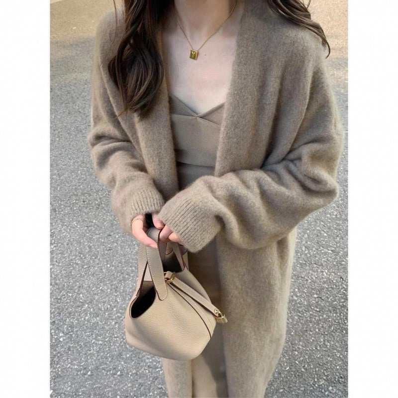 Damen Gemütliche Strickjacke mit oversized Schnitt und sanften Puffärmeln R&B