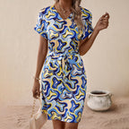 Damen V-Ausschnitt Kleid mit Bindegürtel und modernem Muster