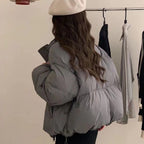Damen Oversized Pufferjacke mit elastischem Bund und seitlichen Reißverschlusstaschen R&B