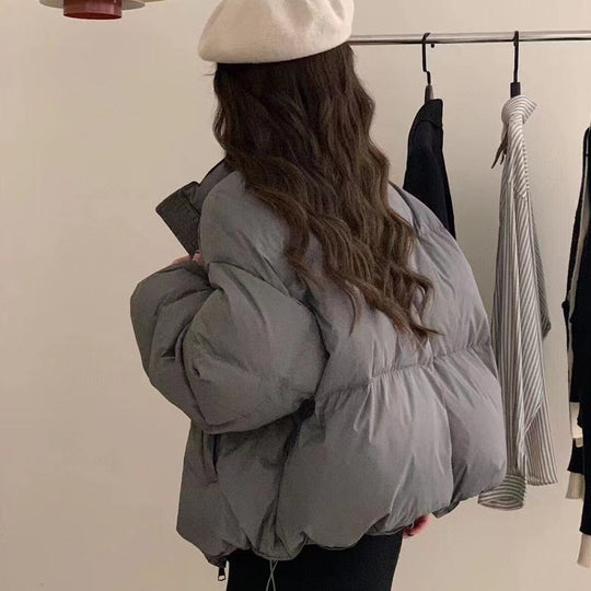 Damen Oversized Pufferjacke mit elastischem Bund und seitlichen Reißverschlusstaschen R&B