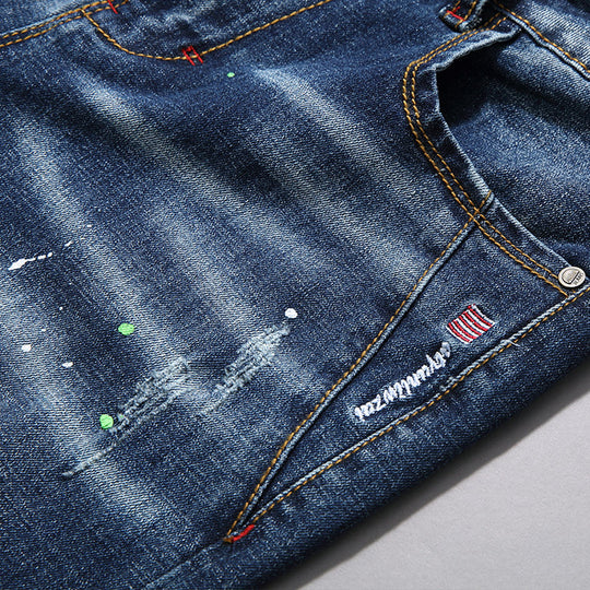Herren modische Jeans mit kreativen Farbklecksen und Rissdesign R&B