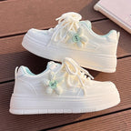 Damen Trendige Sneakers mit blumigen Akzenten und dämpfender Sohle