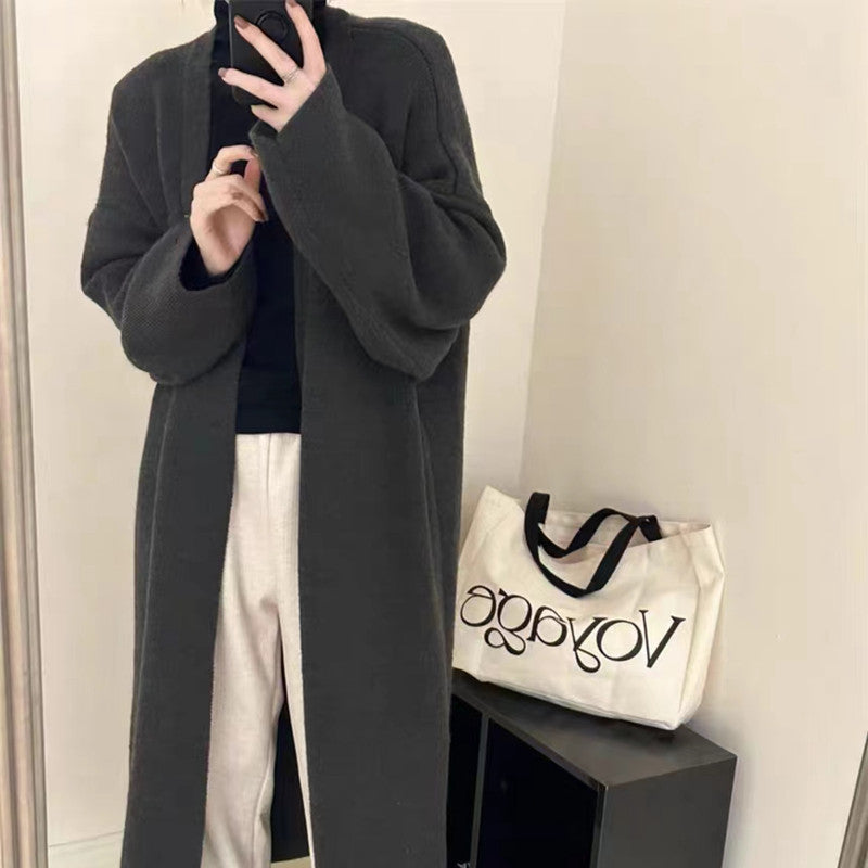 Damen Langer Wollmantel im minimalistischen Stil mit weitem Schnitt und eleganten Details R&B