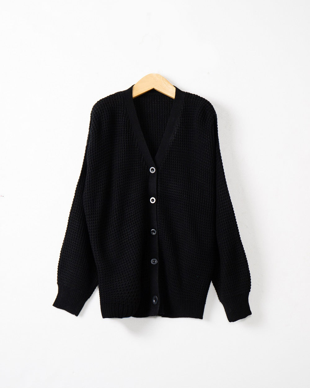 Damen Strickjacke mit strukturiertem Muster und praktischen Knopfdetails