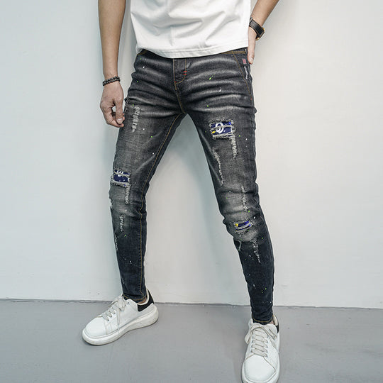 Herren Skinny Fit Jeans im kreativen Rissdesign und bunten Farbsklecks R&B