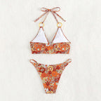 Damen Triangel-Bikini mit modischem Blütenmuster und eleganten Ringdetails