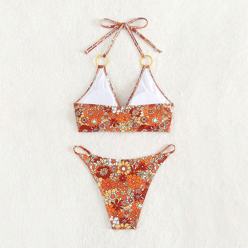 Damen Triangel-Bikini mit modischem Blütenmuster und eleganten Ringdetails