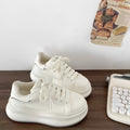 Damen Trendige Plateau-Sneaker mit eleganten Details