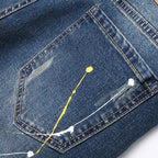 Herren kreative Ripped Jeans mit einzigartigen Farbklecksen R&B