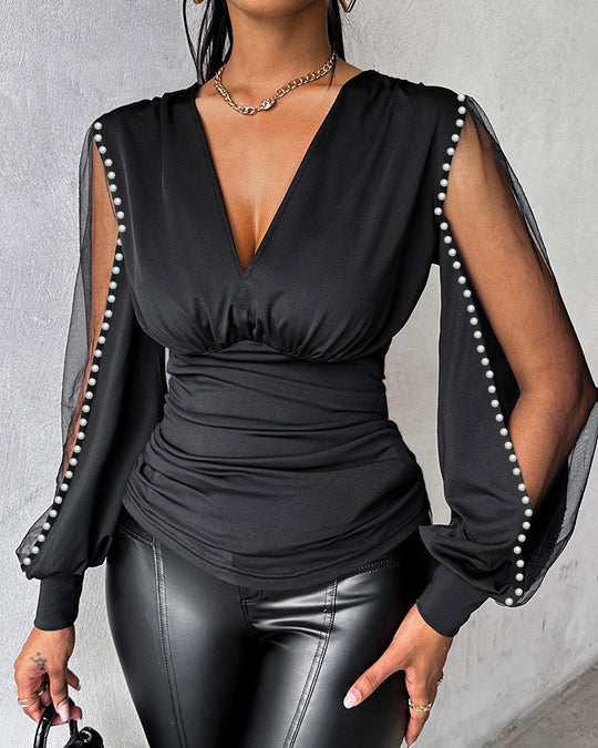 Damen Elegantes Oberteil mit transparenten Puffärmeln und Perlenverzierung R&B