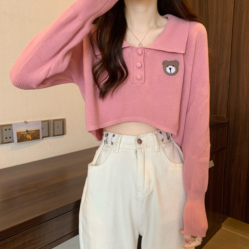 Damen Cropped Pullover mit einem Knopfverschluss und Einhorn-Emblem